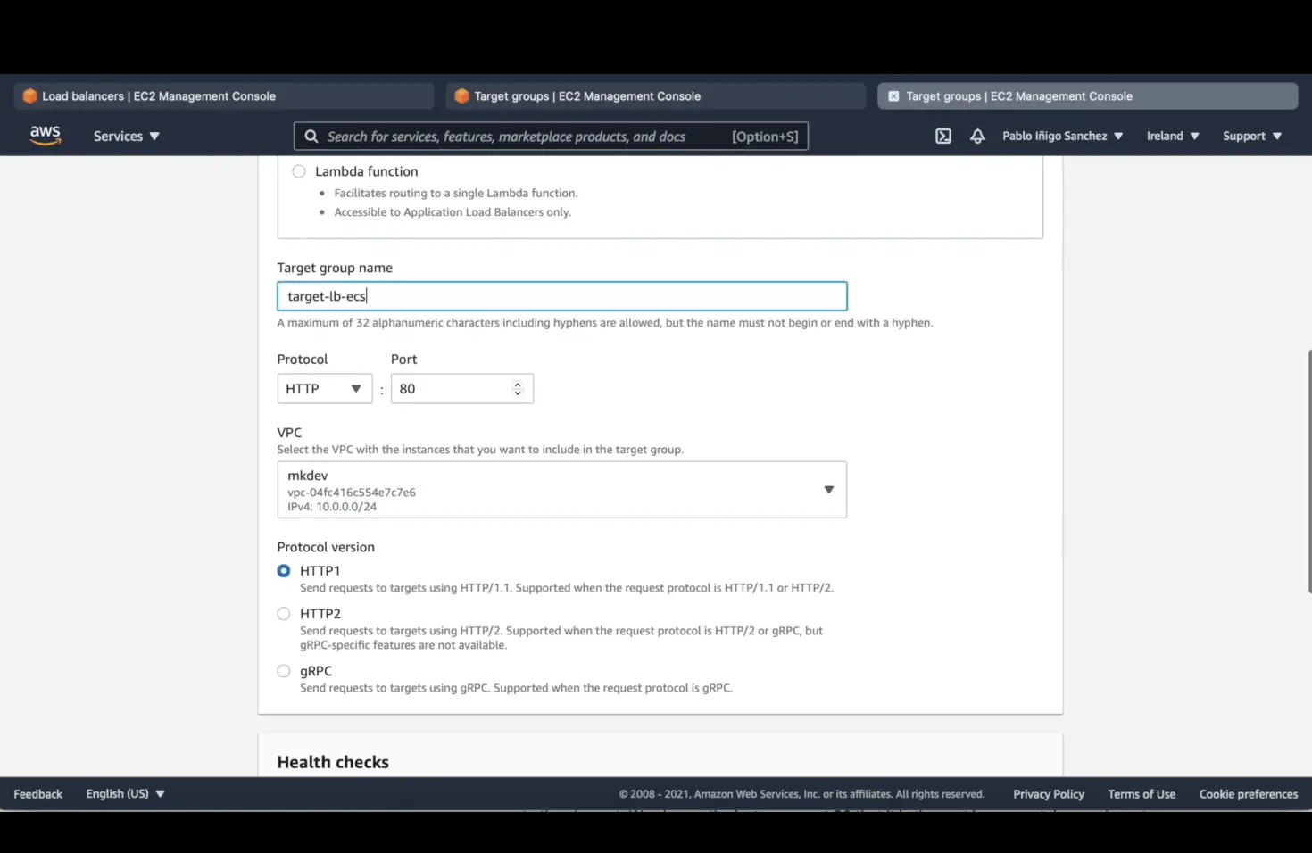 Screenshot of AWS Management Console showing configurations for a target group setup with fields for target group name, protocol, port, VPC, and protocol version, with 'HTTP' selected.