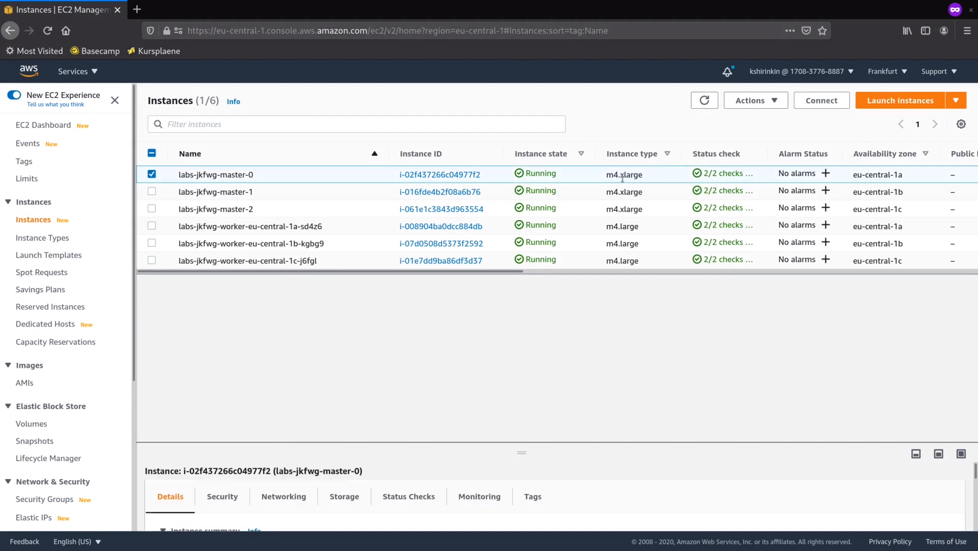 Screenshot of AWS EC2 Management Console displaying a list of running instances with instance IDs, types, status checks, alarm status, and availability zones.