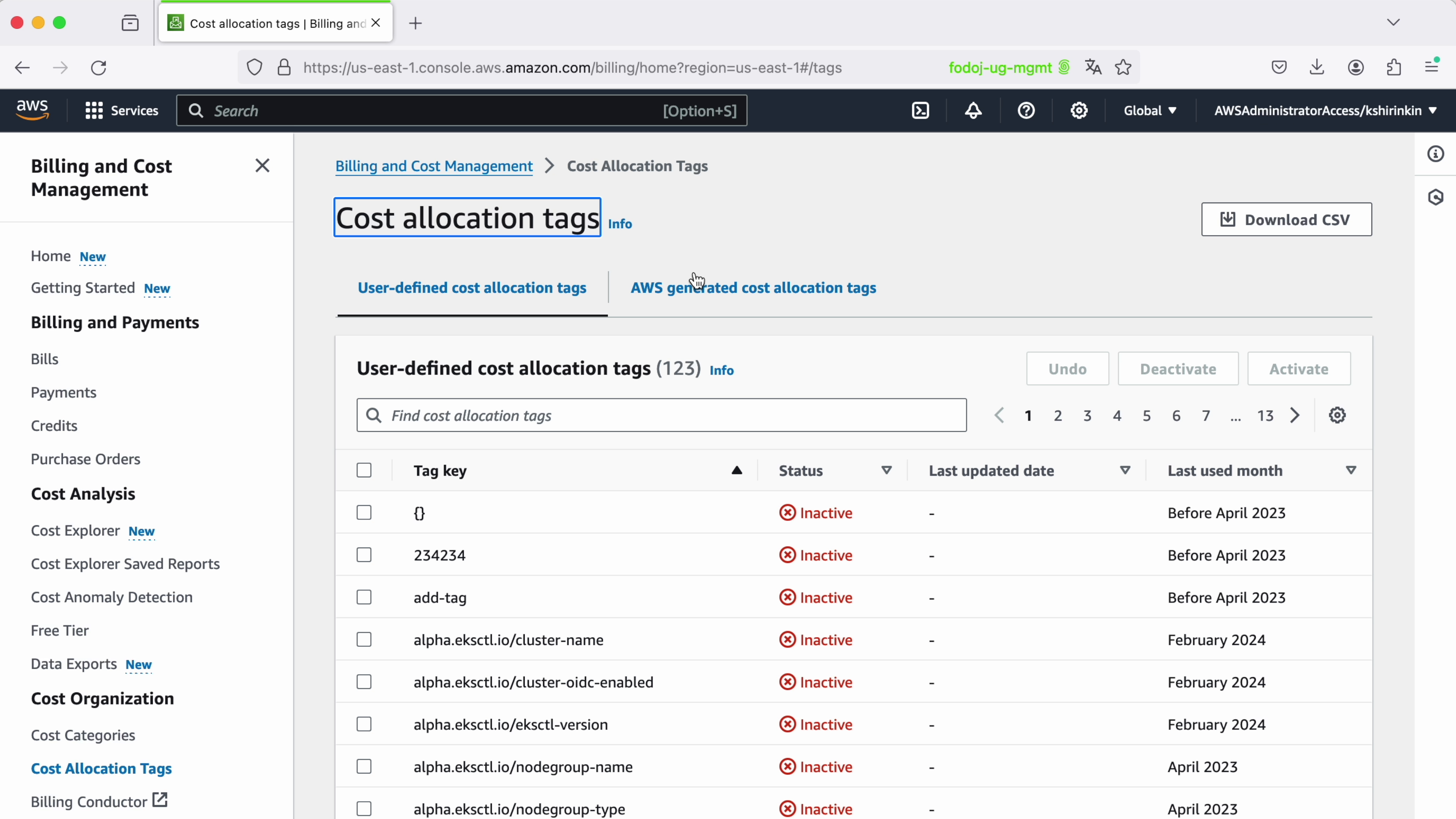 Screenshot of AWS Billing and Cost Management dashboard showing a list of user-defined cost allocation tags with various statuses like inactive, last updated date, and last used month.