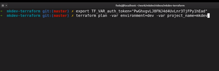 A screenshot of a computer terminal with command-line interface showing commands related to exporting an environment variable and executing a Terraform plan with variable parameters.
