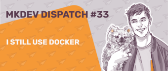 Banner for MKDEV Dispatch #33 featuring an illustrated smiling person holding a small dog with the title "I STILL USE DOCKER" against a geometric pattern background.