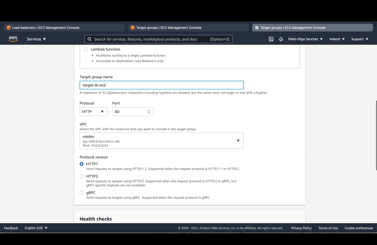 Screenshot of AWS Management Console showing configurations for a target group setup with fields for target group name, protocol, port, VPC, and protocol version, with 'HTTP' selected.
