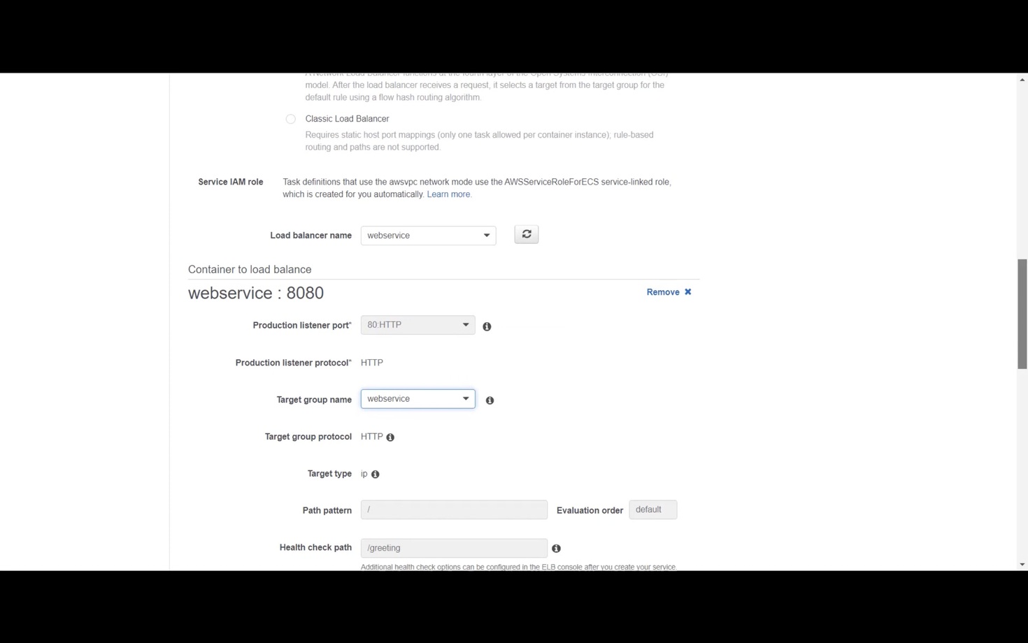 AWS configuration screen showing settings for a load balancer. Includes service IAM role, load balancer name as "webservice," production listener port set to 80.HTTP, and protocol HTTP. Target group name is "webservice" with protocol HTTP, target type IP, path pattern "/", and health check path "/greeting."