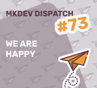 Alt: "MKDEV Dispatch #73 graphic featuring the text 'We Are Happy' with an orange paper airplane illustration on a patterned background of paper airplanes."